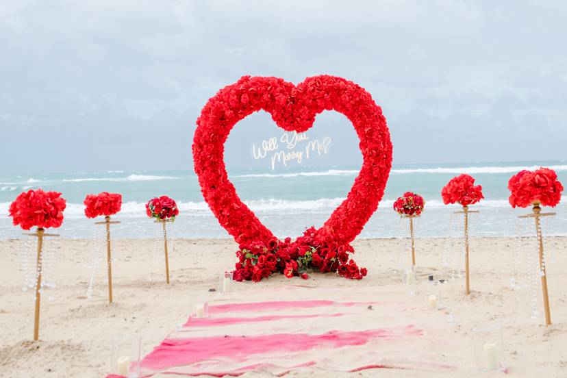 Beach dinner engagement setup Punta Cana sunset