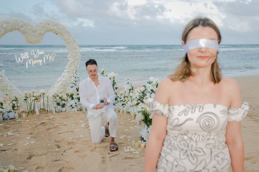 Romantic dinner proposal Punta Cana beach setup candles