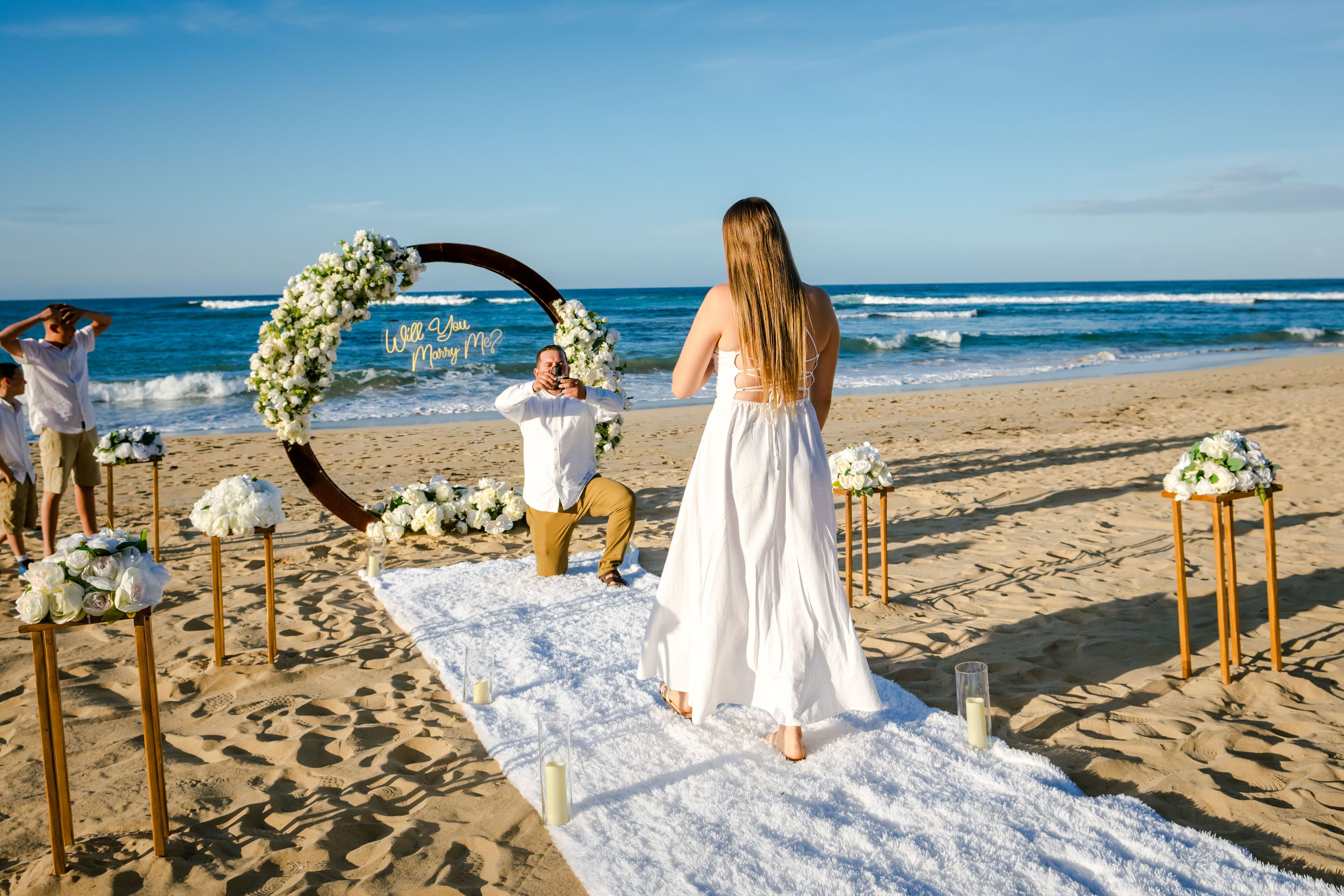 Full service Punta Cana beach proposal setup dinner candles