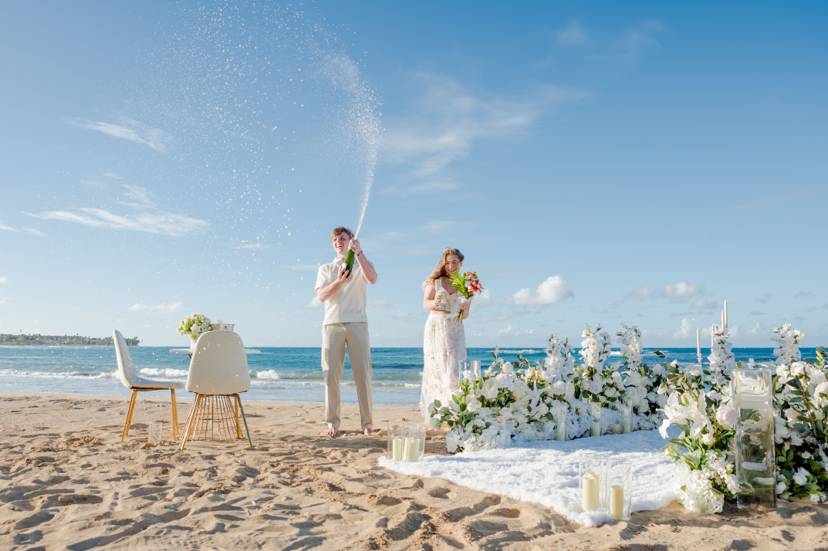 Beach proposal Punta Cana candles flowers dinner setup